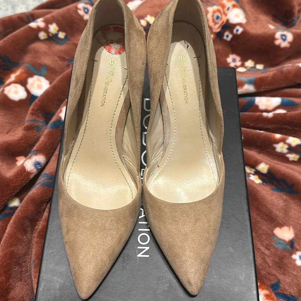 Nude heels. Worn but in good condition. Broken in. Size 6 BCBG